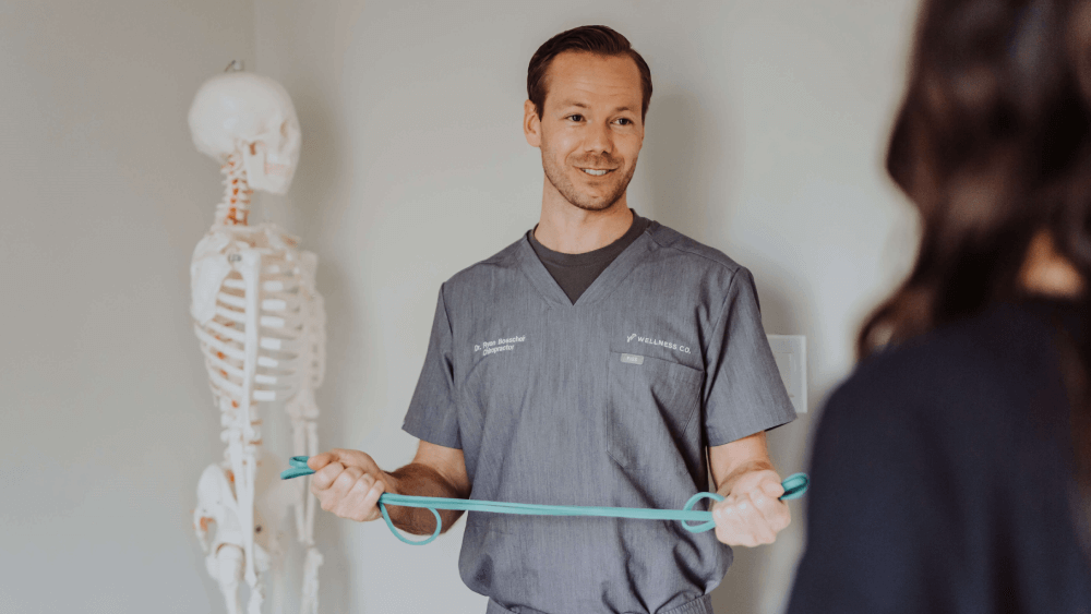Dr. Ryon explaining about treatment of Soft Tissue Therapy | Wellness Co in Zeeland, MI